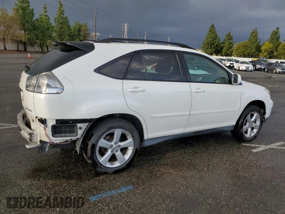 2006 Lexus RX 330 with VIN JTJGA31UX60060839, listed as a Copart auction lot 79948144 with 168,640 mi miles and Salvage Title. Bid and sale history available at DreamBid. Image 3.