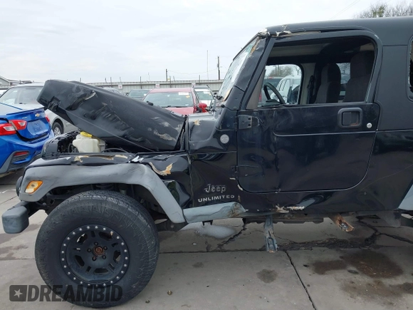 2004 Jeep Wrangler Sport with VIN 1J4FA49S64P794559, listed as a IAAI auction lot 41644201 with 107,445 mi miles. Bid and sale history available at carsss.com. Image 19.