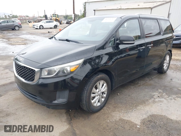 2015 Kia Sedona LX with VIN KNDMB5C14F6051455, listed as a IAAI auction lot 41991513 with 154,967 mi miles and . Bid and sale history available at DreamBid. Image 2.