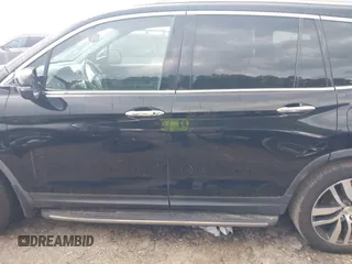 2017 Honda Pilot Touring with VIN 5FNYF5H99HB037126, listed as a IAAI auction lot 42275048 with 164,289 mi miles and . Bid and sale history available at DreamBid. Image 14.