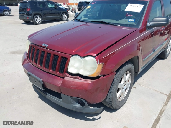 2009 Jeep Grand Cherokee Laredo with VIN 1J8GS48K39C521160, listed as a IAAI auction lot 42039577 with 262,829 mi miles. Bid and sale history available at carsss.com. Image 6.