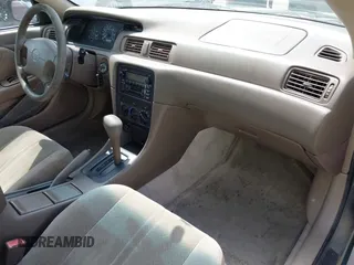 2001 Toyota Camry CE z VIN JT2BG22K310536515, wystawiony jako IAAI lot #42409847 z przebiegiem 205 978 mil mil oraz . Historia ofert i sprzedaży dostępna na DreamBid. Obrazek 5.