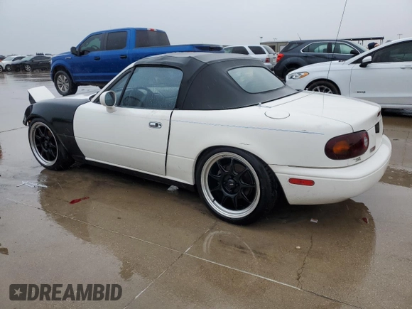 1994 Mazda MX-5 Miata with VIN JM1NA353XR0502129, listed as a Copart auction lot 42827275 with Not provided miles and Salvage title. Bid and sale history available at DreamBid. Image 2.
