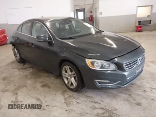 2015 Volvo S60 T5 Drive-E Premier Plus with VIN YV126MFC6F1313759, listed as a IAAI auction lot 41748305 with 43,491 mi miles and . Bid and sale history available at DreamBid. Image 1.
