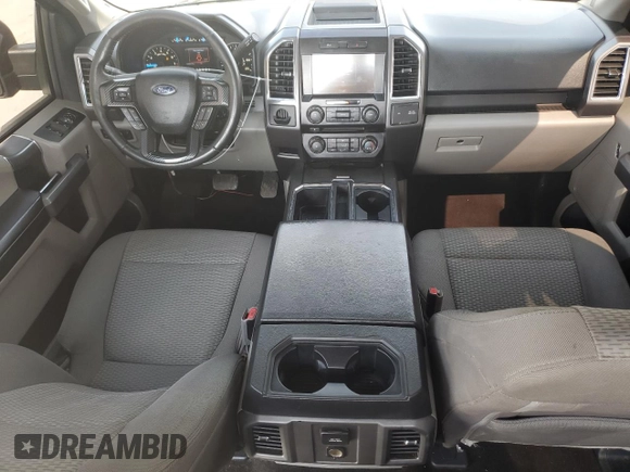 2015 Ford F-150 XLT with VIN 1FTEW1C81FKD32005, listed as a Copart auction lot 48294905 with 142,281 mi miles and Salvage Title. Bid and sale history available at carsss.com. Image 8.