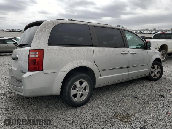 2010 Dodge Grand Caravan SXT with VIN 2D4RN5D12AR159668, listed as a Copart auction lot 49608275 with 212,903 mi miles and Salvage Title. Bid and sale history available at DreamBid. Image 3.