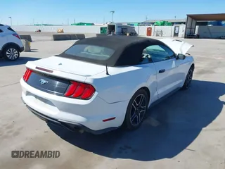 2020 Ford Mustang EcoBoost with VIN 1FATP8UH0L5119932, listed as a IAAI auction lot 41858957 with 61,952 mi miles and . Bid and sale history available at carsss.com. Image 4.