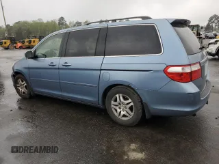 2005 Honda Odyssey EX-L with VIN 5FNRL38645B060123, listed as a Copart auction lot 51112735 with 227,247 mi miles and Salvage Title. Bid and sale history available at carsss.com. Image 2.