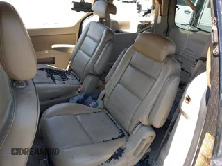 2004 Ford Freestar Limited z VIN 2FMDA58274BA31134, wystawiony jako IAAI lot #41898858 z przebiegiem 117 130 mil mil oraz . Historia ofert i sprzedaży dostępna na DreamBid. Obrazek 8.