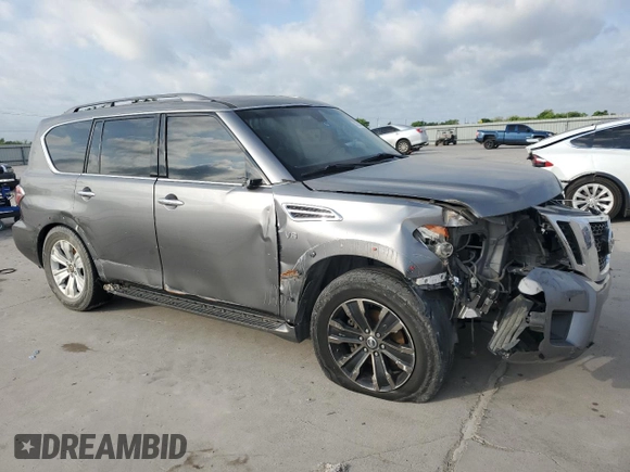 2017 Nissan Armada Platinum z VIN JN8AY2NE2H9700319, wystawiony jako Copart lot #51859735 z przebiegiem Nie podano mil oraz Szkoda całkowita • Salvage title. Historia ofert i sprzedaży dostępna na DreamBid. Obrazek 4.