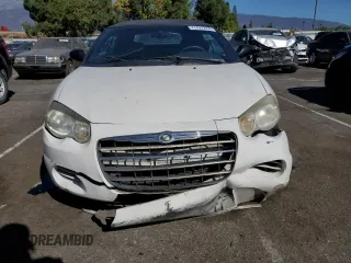 2005 Chrysler Sebring z VIN 1C3EL45X95N625585, wystawiony jako Copart lot #77427224 z przebiegiem 115 553 mil mil oraz Szkoda całkowita • Salvage title. Historia ofert i sprzedaży dostępna na DreamBid. Obrazek 5.