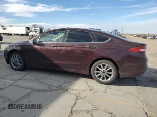 2017 Ford Fusion SE with VIN 3FA6P0H78HR399653, listed as a Copart auction lot 86915704 with 124,088 mi miles and Salvage Title. Bid and sale history available at DreamBid. Image 2.
