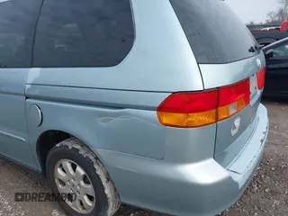 2004 Honda Odyssey EX-RES z VIN 5FNRL18864B093614, wystawiony jako IAAI lot #41674733 z przebiegiem 237 552 mil mil oraz . Historia ofert i sprzedaży dostępna na DreamBid. Obrazek 15.