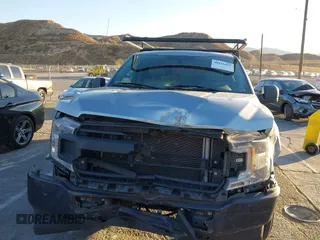 2020 Ford F-150 XL with VIN 1FTMF1CB6LKD12187, listed as a IAAI auction lot 40918052 with 111,570 mi miles and . Bid and sale history available at carsss.com. Image 12.