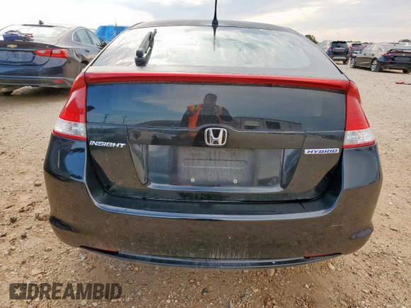 2010 Honda Insight EX z VIN JHMZE2H72AS038002, wystawiony jako Copart lot #58484365 z przebiegiem 178 670 mil mil oraz Szkoda całkowita • Salvage title. Historia ofert i sprzedaży dostępna na DreamBid. Obrazek 6.