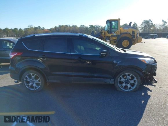 2016 Ford Escape Titanium with VIN 1FMCU0JX3GUA90420, listed as a IAAI auction lot 41850537 with 115,770 mi miles. Bid and sale history available at carsss.com. Image 13.