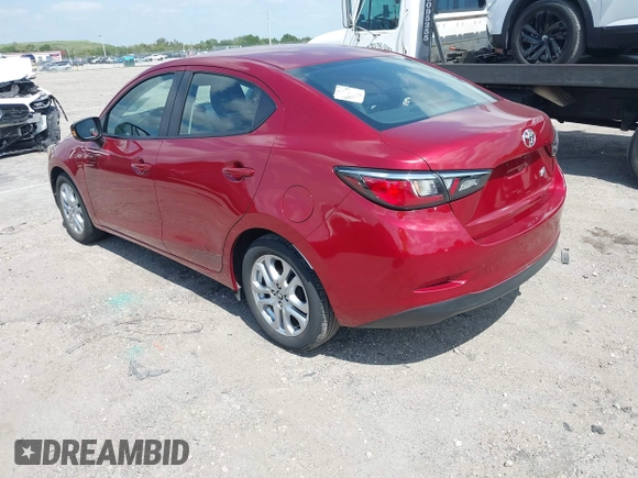 2018 Toyota Yaris with VIN 3MYDLBYV9JY318762, listed as a IAAI auction lot 42109728 with 72,931 mi miles and . Bid and sale history available at DreamBid. Image 3.