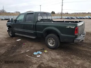 2000 Ford F-250 XL with VIN 1FTNW21F5YEB21513, listed as a Copart auction lot 82013464 with 383,819 mi miles and Salvage title. Bid and sale history available at DreamBid. Image 2.