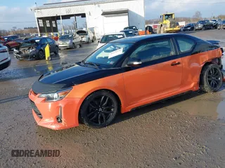 2015 Scion tC with VIN JTKJF5C77FJ008276, listed as a IAAI auction lot 41679236 with 90,987 mi miles. Bid and sale history available at carsss.com. Image 2.