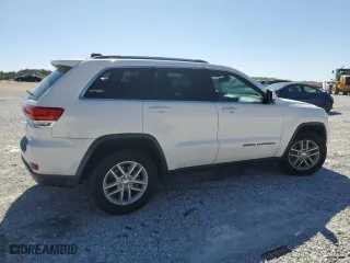 2017 Jeep Grand Cherokee Laredo with VIN 1C4RJEAGXHC717464, listed as a Copart auction lot 53091185 with 140,542 mi miles and Clean Title. Bid and sale history available at carsss.com. Image 3.