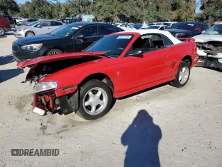 1998 Ford Mustang with VIN 1FAFP4449WF180634, listed as a Copart auction lot 82671504 with 150,195 mi miles and Salvage Title. Bid and sale history available at carsss.com. Image 1.
