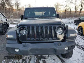 2021 Jeep Wrangler 80th Anniversary with VIN 1C4GJXANXMW638080, listed as a Copart auction lot 86476294 with 37,239 mi miles and Salvage Title. Bid and sale history available at DreamBid. Image 5.