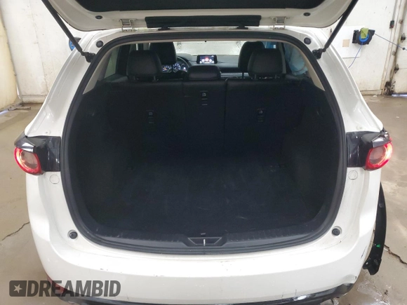2019 Mazda CX-5 Touring with VIN JM3KFBCM1K0697500, listed as a Copart auction lot 46460735 with 69,412 mi miles and Salvage Title. Bid and sale history available at carsss.com. Image 6.