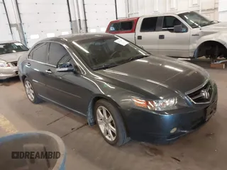 2005 Acura TSX with VIN JH4CL96835C004392, listed as a IAAI auction lot 42396387 with 215,477 mi miles and . Bid and sale history available at DreamBid. Image 1.