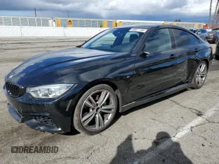 2015 BMW 4 Series 435i with VIN WBA4B1C51FG241376, listed as a Copart auction lot 48821195 with 52,072 mi miles and Salvage Title. Bid and sale history available at carsss.com. Image 1.