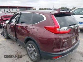 2019 Honda CR-V EX-L with VIN 7FARW1H83KE017311, listed as a IAAI auction lot 41513670 with 87,196 mi miles. Bid and sale history available at carsss.com. Image 3.