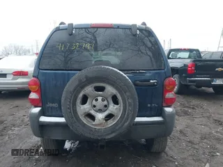 2002 Jeep Liberty Sport with VIN 1J8GL48K32W132617, listed as a IAAI auction lot 41732799 with 202,894 mi miles. Bid and sale history available at carsss.com. Image 17.