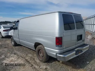 1998 Ford Econoline Cargo with VIN 1FTRE1428WHB30628, listed as a IAAI auction lot 41706164 with 153,223 mi miles. Bid and sale history available at carsss.com. Image 3.