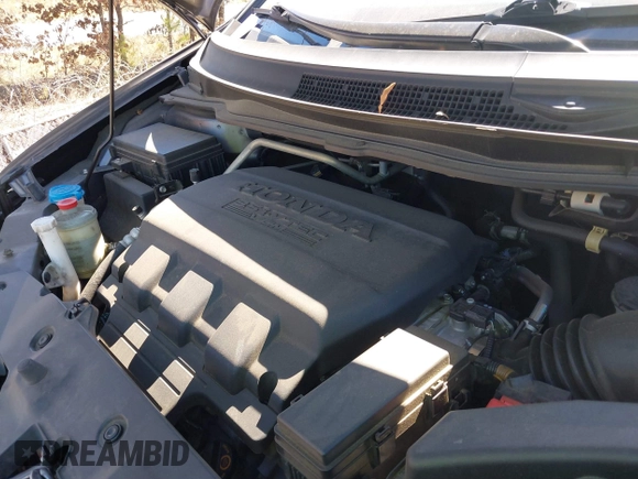 2014 Honda Odyssey Touring with VIN 5FNRL5H92EB016546, listed as a IAAI auction lot 41689148 with 143,601 mi miles and . Bid and sale history available at DreamBid. Image 10.