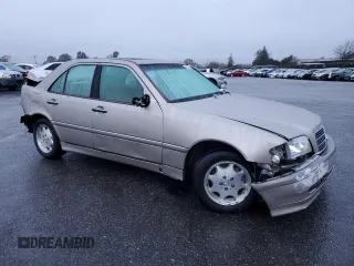 1999 Mercedes-Benz C 230/260/280/320 with VIN WDBHA29G9XA747479, listed as a Copart auction lot 85395074 with 98,299 mi miles and Salvage Title. Bid and sale history available at carsss.com. Image 4.