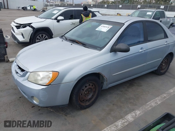 2005 Kia Spectra LX with VIN KNAFE121755142490, listed as a IAAI auction lot 42085928 with 170,406 mi miles. Bid and sale history available at carsss.com. Image 2.