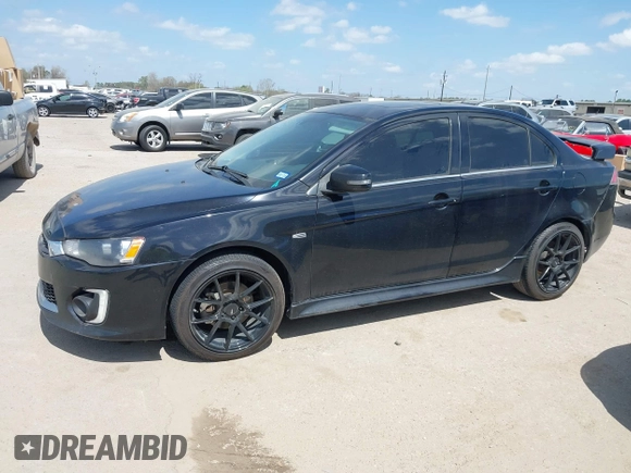 2016 Mitsubishi Lancer GT with VIN JA32U8FW8GU011501, listed as a IAAI auction lot 41779016 with 153,082 mi miles. Bid and sale history available at carsss.com. Image 14.