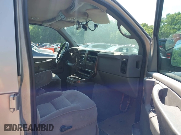 2004 Chevrolet Express Passenger with VIN 1GBFG15T041157045, listed as a IAAI auction lot 42486752 with 319,752 mi miles and . Bid and sale history available at DreamBid. Image 5.