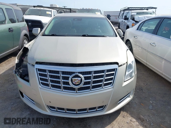 2013 Cadillac XTS Premium z VIN 2G61S5S35D9143656, wystawiony jako IAAI lot #42099511 z przebiegiem 207 055 mil mil oraz . Historia ofert i sprzedaży dostępna na DreamBid. Obrazek 12.