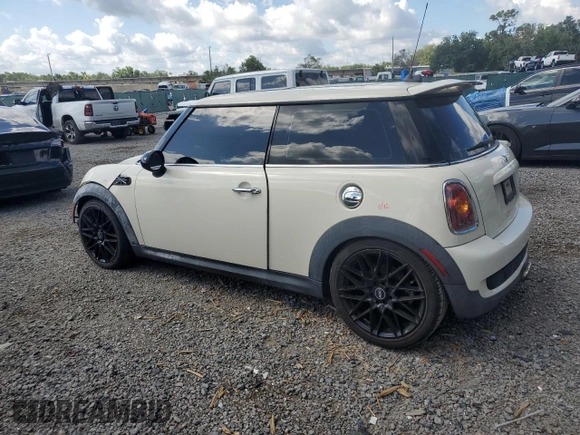 2010 MINI Hardtop S with VIN WMWMF7C5XATW89025, listed as a Copart auction lot 56106705 with 141,216 mi miles and Salvage title. Bid and sale history available at DreamBid. Image 2.