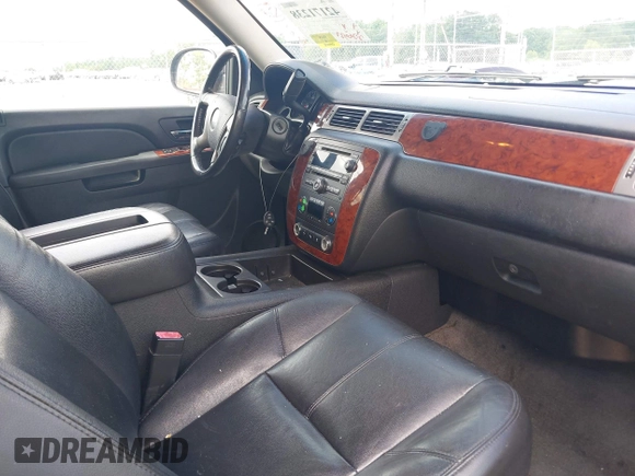 2011 Chevrolet Suburban LT with VIN 1GNSKJE37BR337895, listed as a IAAI auction lot 42171238 with 228,327 mi miles and . Bid and sale history available at DreamBid. Image 5.