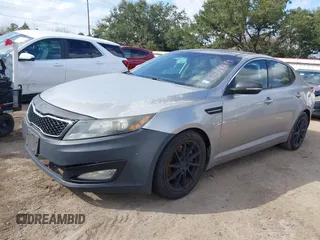 2012 Kia Optima EX with VIN 5XXGN4A6XCG071476, listed as a IAAI auction lot 41508819 with 176,487 mi miles and . Bid and sale history available at carsss.com. Image 2.