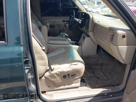 2002 Chevrolet Suburban LT with VIN 1GNEC16Z52J330522, listed as a IAAI auction lot 42251636 with 292,936 mi miles and . Bid and sale history available at DreamBid. Image 5.