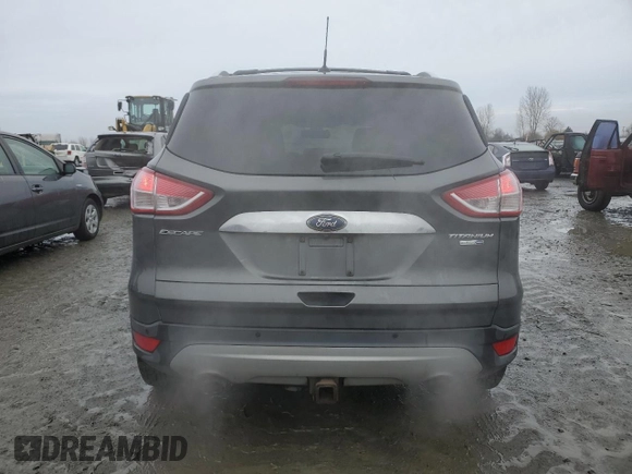2015 Ford Escape Titanium with VIN 1FMCU9J92FUA62323, listed as a Copart auction lot 85826724 with 108,315 mi miles and Salvage Title. Bid and sale history available at DreamBid. Image 6.