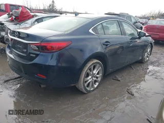 2016 Mazda Mazda6 i Touring with VIN JM1GJ1T54G1434497, listed as a IAAI auction lot 41654012 with 133,901 mi miles. Bid and sale history available at carsss.com. Image 4.