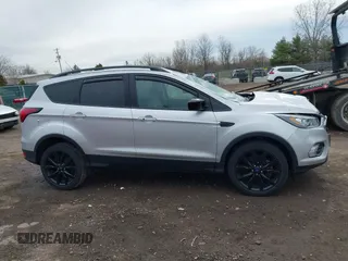 2019 Ford Escape SE with VIN 1FMCU9GD7KUB29309, listed as a IAAI auction lot 41876535 with 90,688 mi miles. Bid and sale history available at carsss.com. Image 13.