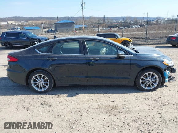 2020 Ford Fusion SE with VIN 3FA6P0LU4LR262988, listed as a IAAI auction lot 41768189 with 64,086 mi miles and . Bid and sale history available at DreamBid. Image 14.