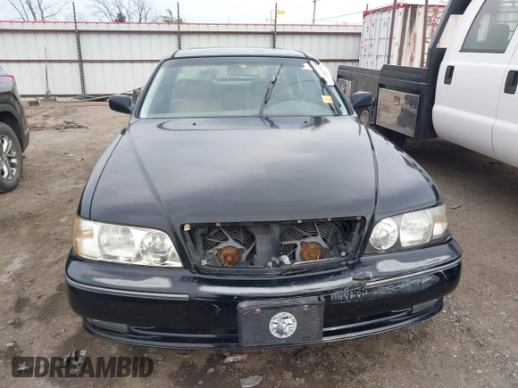 1999 Infiniti Q45 z VIN JNKBY31A3XM602466, wystawiony jako IAAI lot #41721377 z przebiegiem 113 158 mil mil oraz . Historia ofert i sprzedaży dostępna na DreamBid. Obrazek 12.