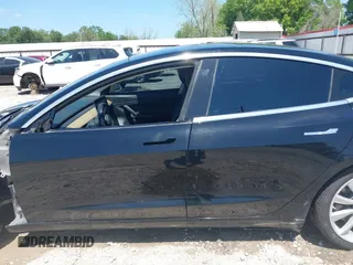 2018 Tesla Model 3 Long Range Battery with VIN 5YJ3E1EAXJF019907, listed as a IAAI auction lot 41995969 with Not Provided miles and . Bid and sale history available at DreamBid. Image 15.