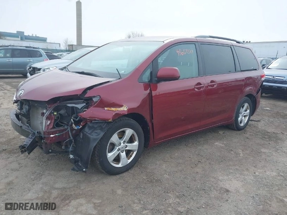 2014 Toyota Sienna LE AAS with VIN 5TDKK3DC6ES433383, listed as a IAAI auction lot 41607527 with 115,235 mi miles. Bid and sale history available at carsss.com. Image 2.