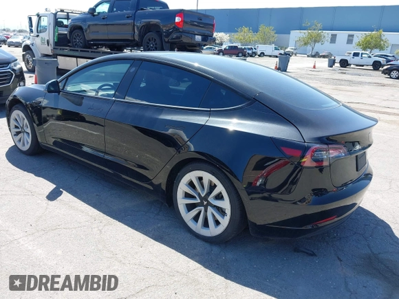 2021 Tesla Model 3 Long Range with VIN 5YJ3E1EB4MF064631, listed as a IAAI auction lot 41424856 with 95,511 mi miles and . Bid and sale history available at DreamBid. Image 3.